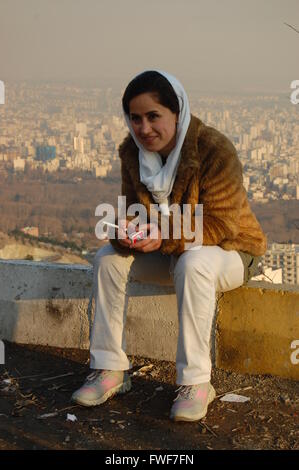 Iranian woman smoking in Tochal, Tehran, Iran Stock Photo