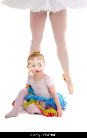 An infant dance child in a tutu with a ballerina's legs in platter tutu Stock Photo