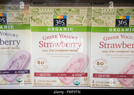 A box of Whole Foods brand 365 organic frozen greek yogurt dessert bars. Stock Photo