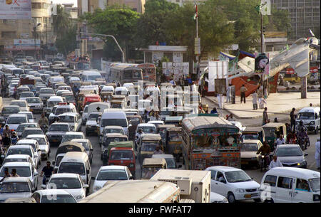 Huge numbers of motors stuck in traffic jam due to flow of sewerage water on road nearby Nazimabad Board Office in Karachi on Monday, April 04, 2016. Stock Photo