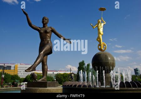 Sculptures at the fountain in front of the stationary Circus of Kazakhstan's young capital Astana. Picture taken 2013-06-24. Stock Photo