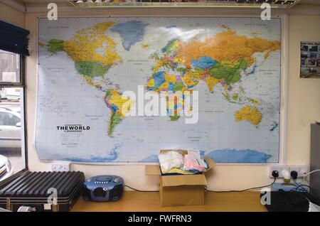 Preston, Lancashire.  A map of the world pinned to an office wall. Stock Photo