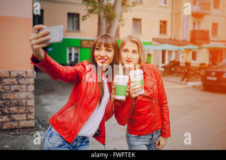 girls with phone Stock Photo