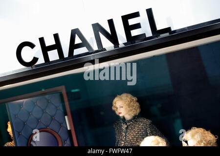 Chanel sign and shop front with part of window display situated on the Croisette Boulevard, Cannes, France. Stock Photo