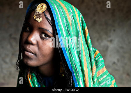 Young woman belonging to the Afar tribe. Once married, she will be her husband third wife in a polygamous marriage ( Ethiopia) Stock Photo