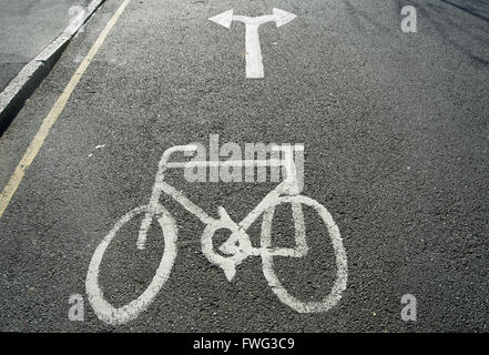 british road marking showing a cycle image and choice of left or right turn Stock Photo