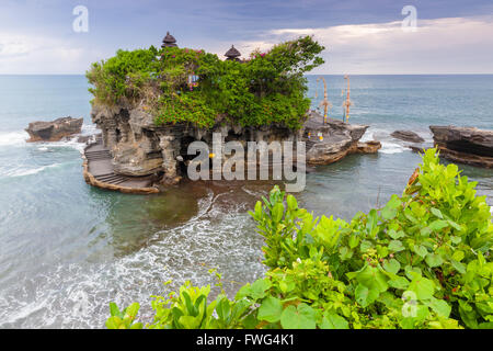 Pura Tanah Lot at sunset, famous ocean temple in Bali, Indonesia. Stock Photo