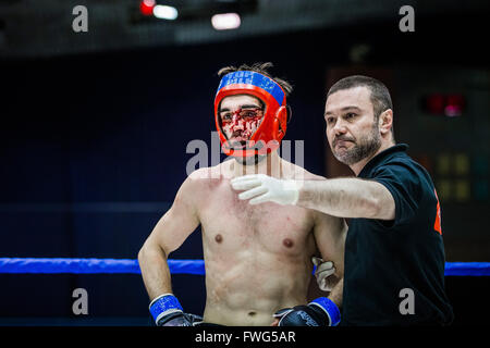 fighter fighter bloody face during match Stock Photo