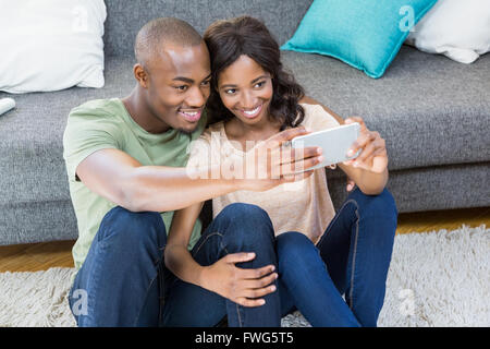 Young couple taking selfie Stock Photo