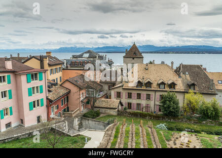 View over rooftops and Lac Leman, in Nyon, Switzerland. Stock Photo
