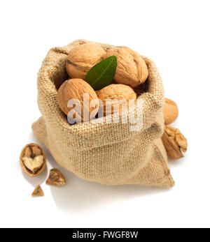 walnuts in bag isolated on white background Stock Photo