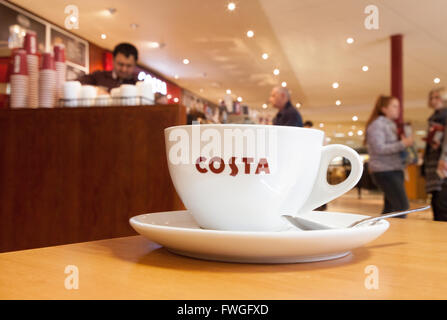 Costa Coffee cup on a table, South Mimms motorway service station, M25 Services, London UK Stock Photo