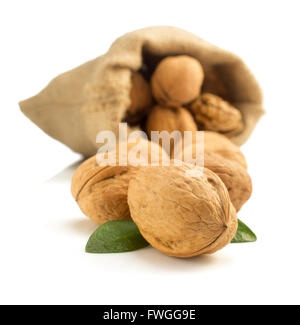walnuts in bag isolated on white background Stock Photo