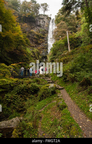 Tourists enjoying the view at Pistyll Rhaeadr waterfall in Powys Wales one of the Seven Wonders of Wales Stock Photo