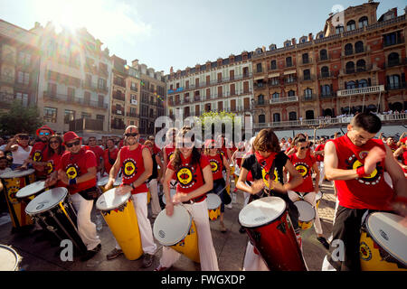 Spain Navarra Pamplona 10 July 2015 band playing drums in front of the famous café IRUNA for S. Firmino fiesta spanish school of Stock Photo