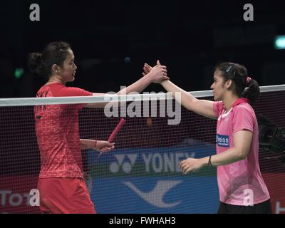 Sydney, Australia. 12th June, 2016. Saina Nehwal of India (R) and Sun Yu of China shake hands after women's singles final match at Australian Badminton Open 2016 in Sydney, Australia, June 12, 2016. Nehwal won 2-1 and claimed the title of the event. © Hewitt Wang/Xinhua/Alamy Live News Stock Photo
