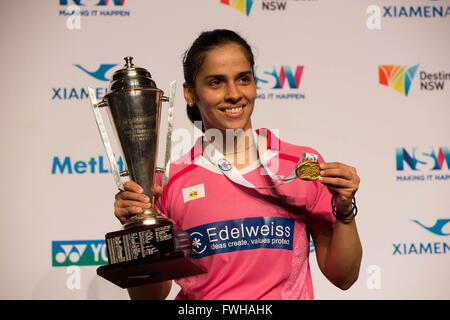 Sydney, Australia. 12th June, 2016. Saina Nehwal of India poses during the awarding ceremony after women's singles final match at Australian Badminton Open 2016 in Sydney, Australia, June 12, 2016. Nehwal defeated China's Sun Yu 2-1 and claimed the title of the event. © Zhu Hongye/Xinhua/Alamy Live News Stock Photo