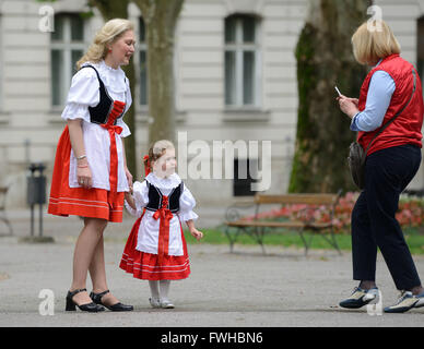 Zagreb, Croatia. 12th June, 2016. Participants dressed in Czech folk costumes pose for photography during the annual Day of National Minorities at Zrinjevac Park in Zagreb, Croatia, June 12, 2016. Members of 18 national minorities settled in Croatia presented their traditional customs, food and folklore to tourists and locals on Sunday. Credit:  Miso Lisanin/Xinhua/Alamy Live News Stock Photo