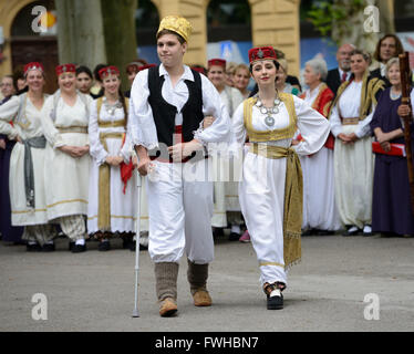 Zagreb, Croatia. 12th June, 2016. Participants dressed in Bosnian folk costumes perform during the annual Day of National Minorities at Zrinjevac Park in Zagreb, Croatia, June 12, 2016. Members of 18 national minorities settled in Croatia presented their traditional customs, food and folklore to tourists and locals on Sunday. Credit:  Miso Lisanin/Xinhua/Alamy Live News Stock Photo