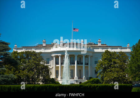 Washington, DC, USA. 12th June, 2016. The U.S. national flag flies at half-mast at the White House to mourn the victims of the mass shooting at a gay night club in Orlando, in Washington, DC, the United States, June 12, 2016. U.S. President Obama has ordered U.S. flags at half-staff on Sunday. © Bao Dandan/Xinhua/Alamy Live News Stock Photo