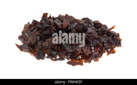 A portion of diced prunes isolated on a white background. Stock Photo