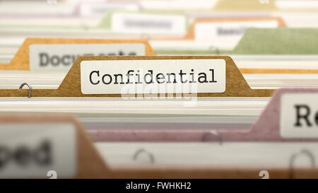 File Folder Labeled as Confidential. Stock Photo