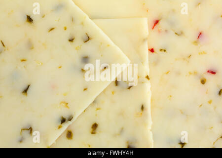 A very close view of pepper jack cheese. Stock Photo