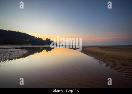 Sunrise in Cherating beach - a popular beach resort in Pahang, Malaysia Stock Photo