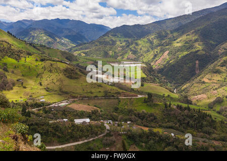 Perched High In The Mountains, Near Tungurahua Volcano Is Nestle A Traditional Community Of Indigenous People, South America Stock Photo