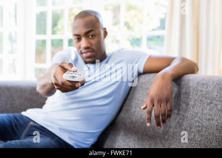 Young man relaxing on the sofa Stock Photo
