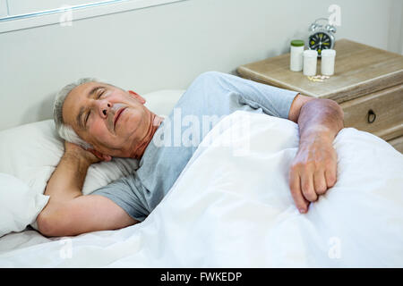 High angle view of senior man sleeping Stock Photo