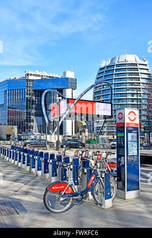 Santander bike hire docking station point at Old Street Station on Tech City Silicon Roundabout junction of Old Street & City Road London England UK Stock Photo