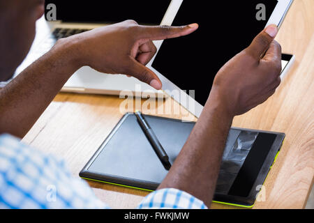 Graphic designer using digital tablet Stock Photo