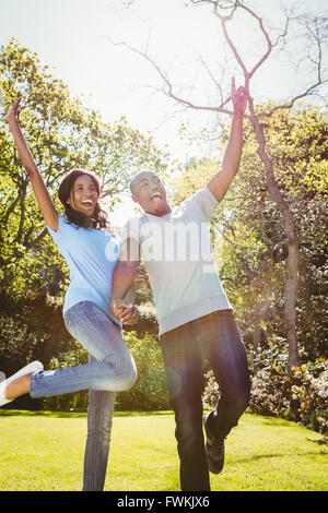Young couple having fun and dancing Stock Photo
