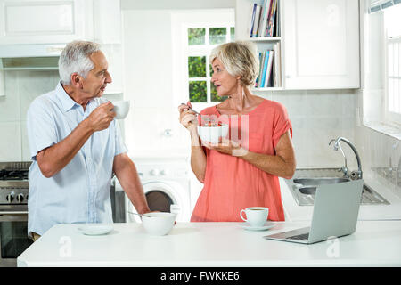 Happy senior couple having breakfast Stock Photo