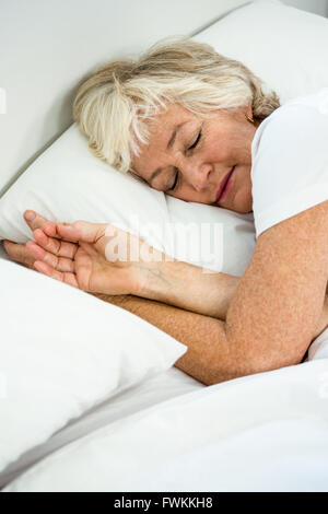 High angle view of senior woman sleeping Stock Photo