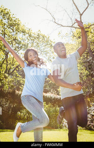Young couple having fun and dancing Stock Photo