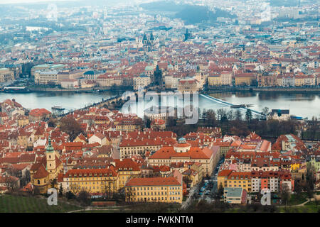 General top view of historical gothic Prague cityscape with old buildings and towers around. Stock Photo