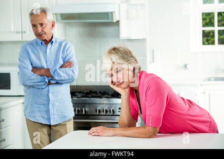 Upset senior couple after argument Stock Photo