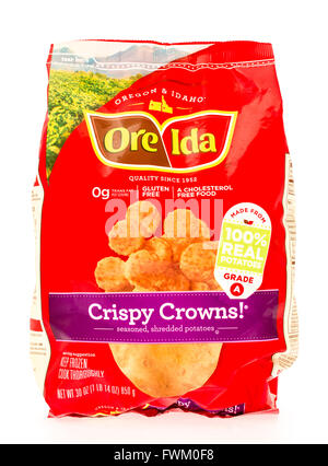 Winneconne, WI - 29 August 2015: Bag of Ore Ida crispy crowns, made from 100% potatoes. Stock Photo