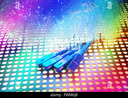 optical fibres dinamic flying from deep on technology background Stock Photo