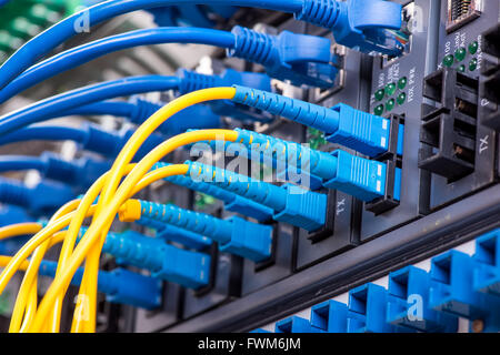 Fiber optic connecting on core network swtich Stock Photo