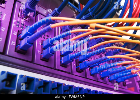 Fiber optic connecting on core network swtich Stock Photo