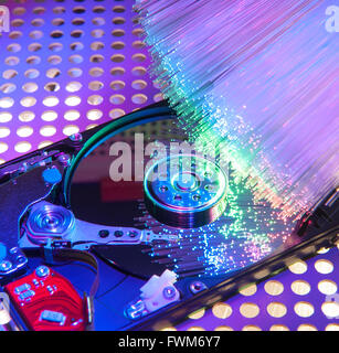 harddisk with fiber optical background Stock Photo