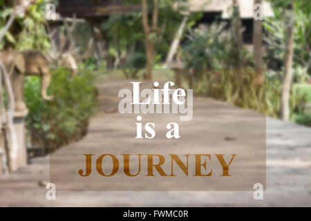 Life is a journey inspirational quote on garden background Stock Photo