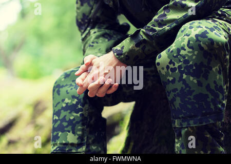 close up of young soldier in military uniform Stock Photo