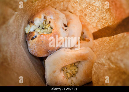 At Kossar’s, they have been baking their legendary bialys since 1936, and now the oldest remaining Bialy bakery in the USA Stock Photo