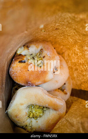 At Kossar’s, they have been baking their legendary bialys since 1936, and now the oldest remaining Bialy bakery in the USA Stock Photo