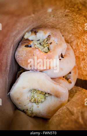 At Kossar’s, they have been baking their legendary bialys since 1936, and now the oldest remaining Bialy bakery in the USA Stock Photo