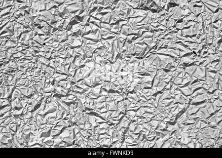 Pattern of Wrinkled Aluminium Foil Paper, closeup Stock Photo